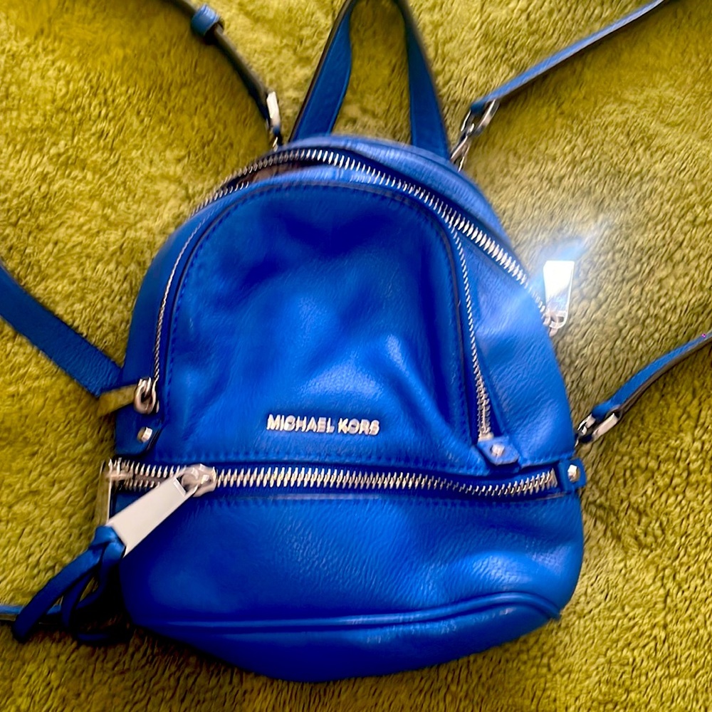 Beautiful blue mini backpack. Excellent condition